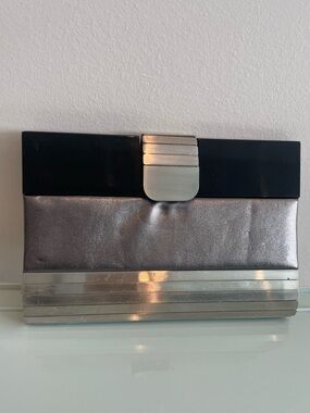Sondra Roberts Black Handbag with Silver Plaque